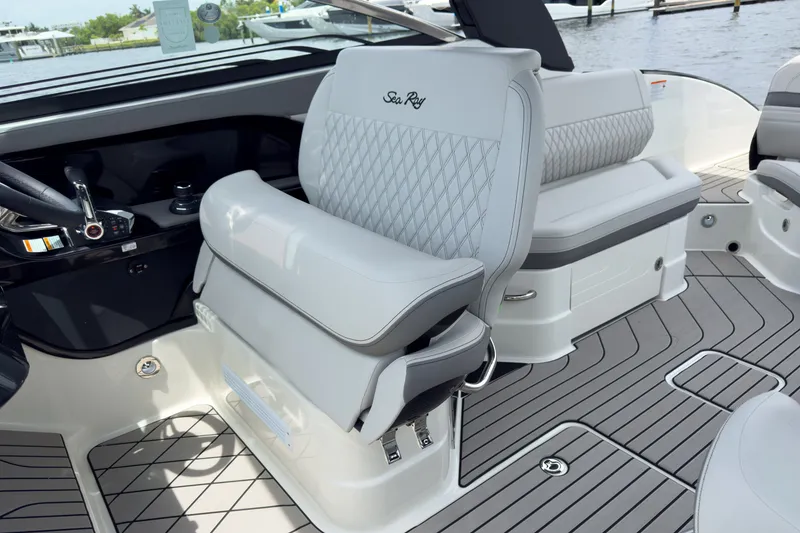 Slide: The Image of The image shows the interior of a 2027 Sea Ray SLX 280 Outboard with elegant seating. - 9