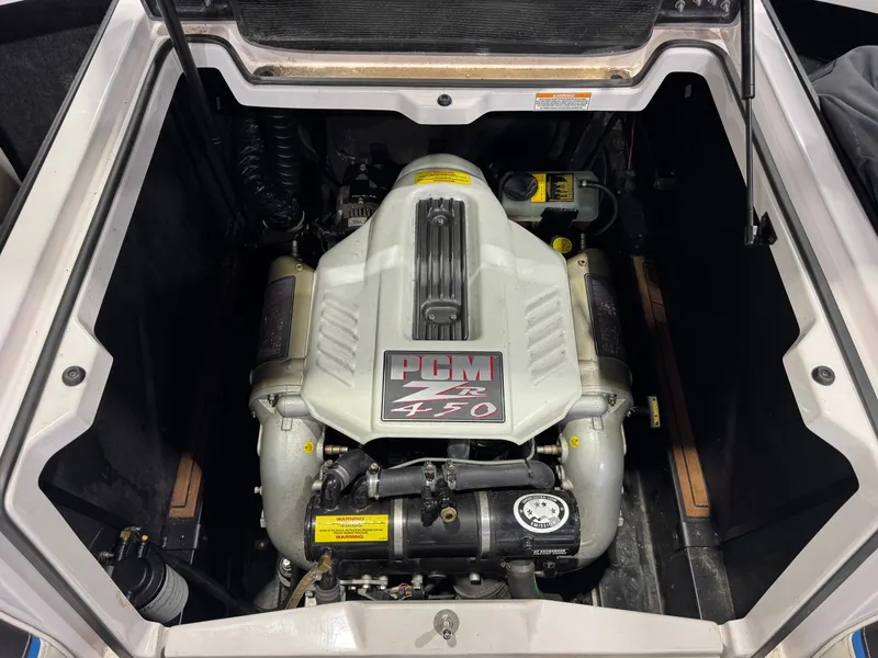 Slide: The Image of Engine compartment of 2013 Nautique Super Air Nautique G25 boat. - 29