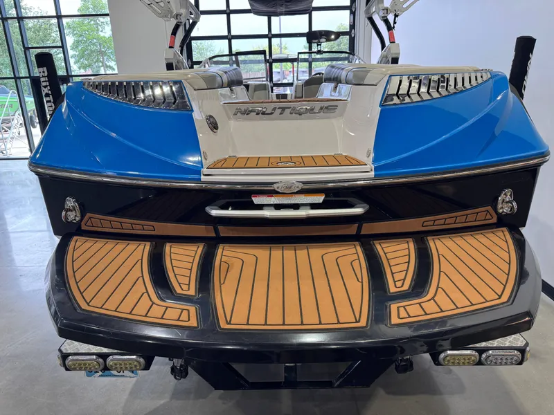Slide: The Image of Rear view of a 2013 Nautique Super Air Nautique G25 boat. - 9
