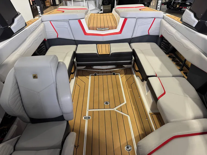 Slide: The Image of Interior of 2025 Nautique Super Air Nautique G23 with luxurious seating. - 22
