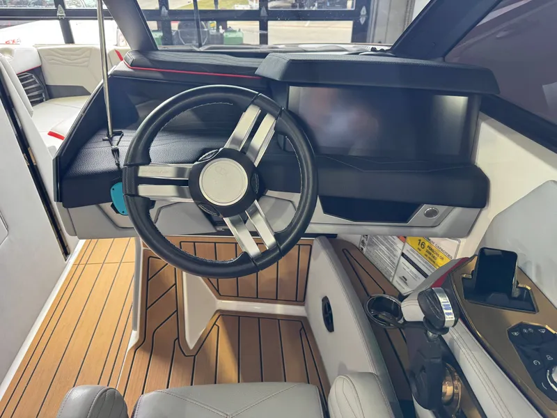 Slide: The Image of Interior of the 2025 Nautique Super Air Nautique G23 boat. - 26