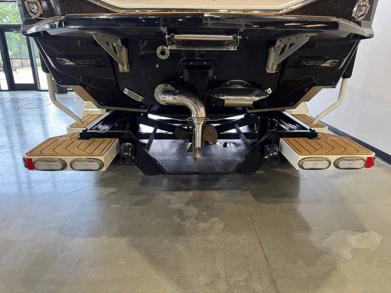 Slide: The Image of Rear view of 2025 Nautique Super Air Nautique G23 boat. - 7