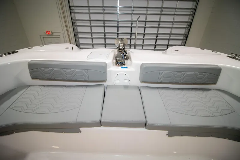 Slide: The Image of 2023 Twin Vee 340 GFX CC boat interior with cushioned seating and modern design. - 16