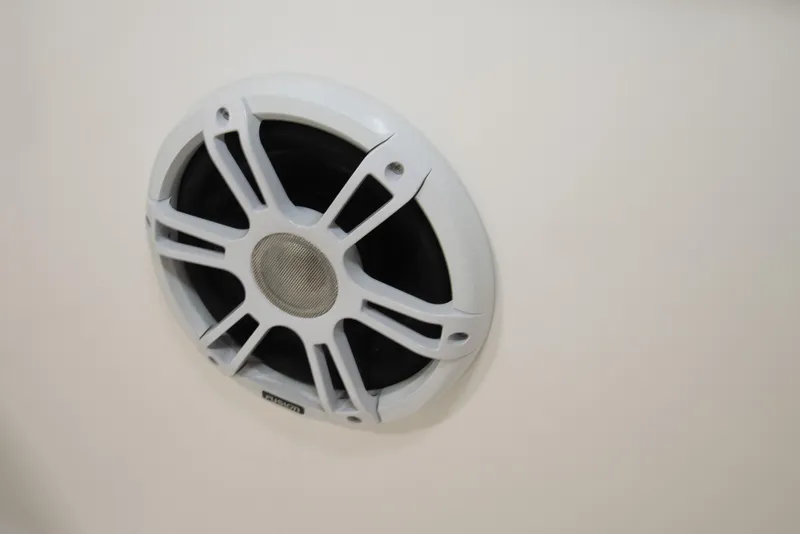Slide: The Image of Close-up of a white speaker on a 2023 Twin Vee 340 GFX CC boat. - 36