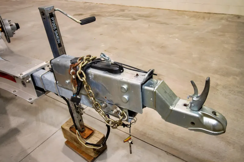 Slide: The Image of Trailer hitch of a 2023 Twin Vee 340 GFX CC on a concrete floor. - 41