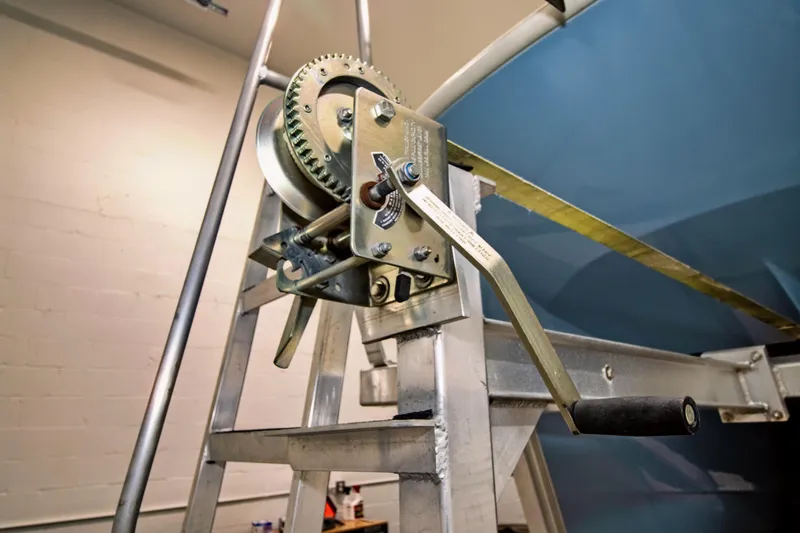 Slide: The Image of Close-up of a winch mechanism on a 2023 Twin Vee 340 GFX CC boat. - 44