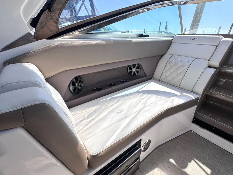 Slide: The Image of Interior of 2018 Regal 28 Express with luxurious seating. - 12