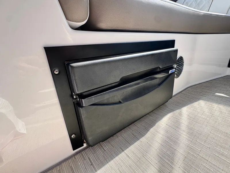 Slide: The Image of 2018 Regal 28 Express boat cabin with speaker. - 13