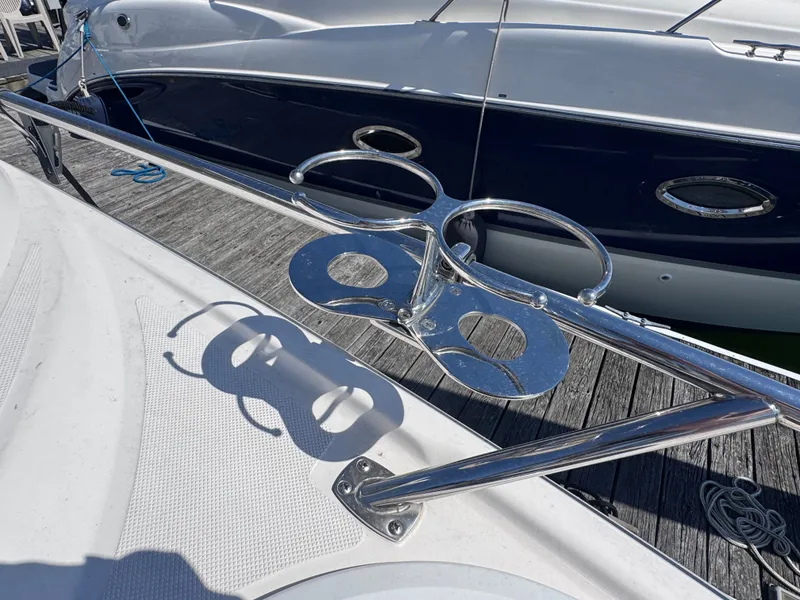 Slide: The Image of 2018 Regal 28 Express with stainless steel cup holder on deck. - 19