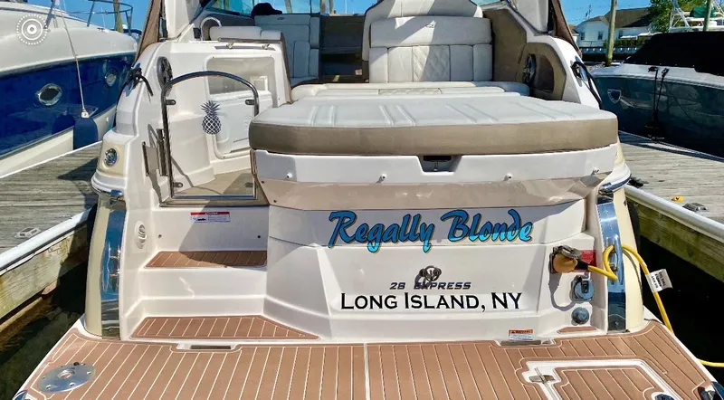 Slide: The Image of 2018 Regal 28 Express boat docked in Long Island, NY. - 2