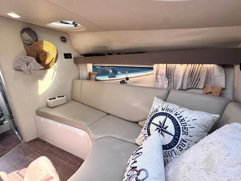 Slide: The Image of Interior of a 2018 Regal 28 Express yacht with cozy cushions. - 25