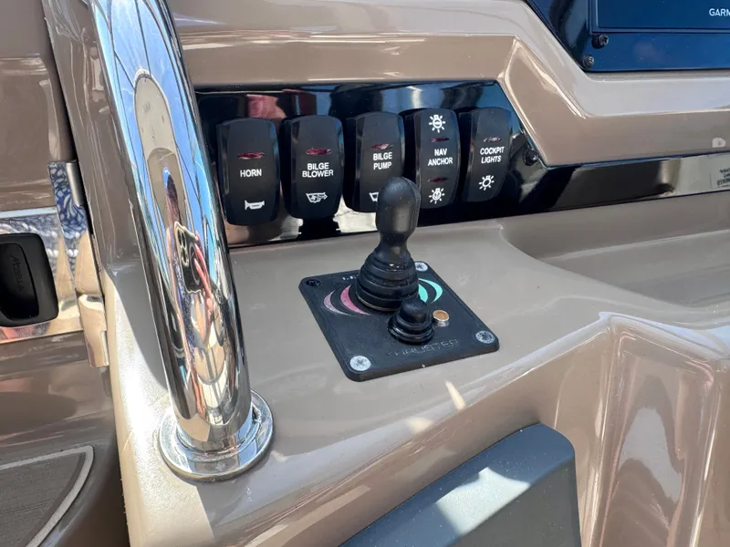 Slide: The Image of Control panel of a 2018 Regal 28 Express boat. - 9