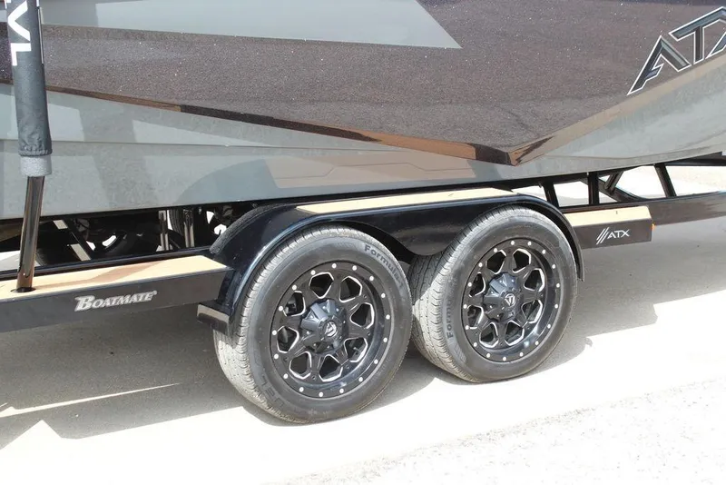 Slide: The Image of 2024 ATX Surf Boats 22 Type-S trailer with dual black alloy wheels. - 10
