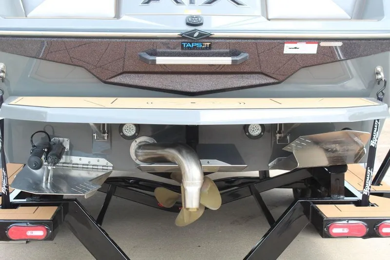Slide: The Image of Rear view of 2024 ATX Surf Boats 22 Type-S, showcasing propeller and surf system components. - 34