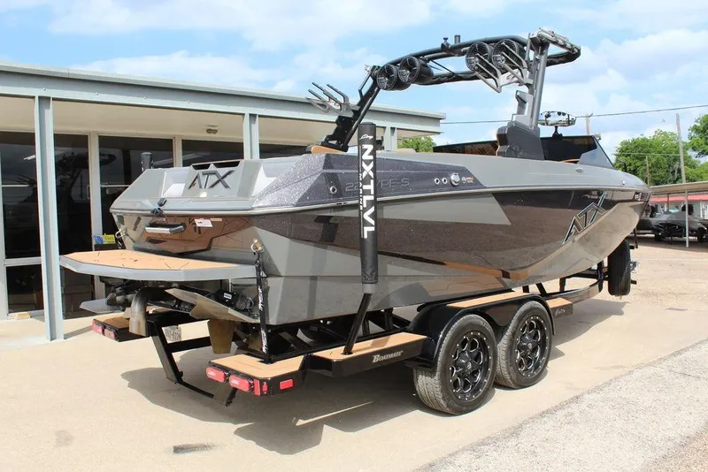 Slide: The Image of 2024 ATX Surf Boats 22 Type-S on trailer, showcasing sleek design and modern features. - 37