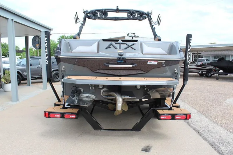 Slide: The Image of 2024 ATX Surf Boats 22 Type-S, rear view, showcasing sleek design and advanced features. - 4