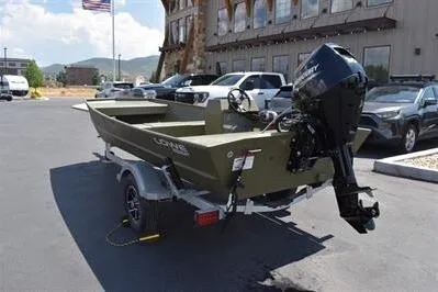 Slide: The Image of 2025 Lowe L1652MT Jon boat on trailer, parked outdoors with motor attached. - 5