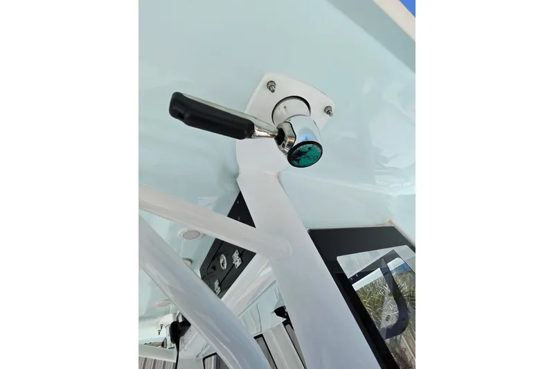Slide: The Image of Close-up of a 2019 Sea Hunt Gamefish 27 boat handle and control lever. - 22