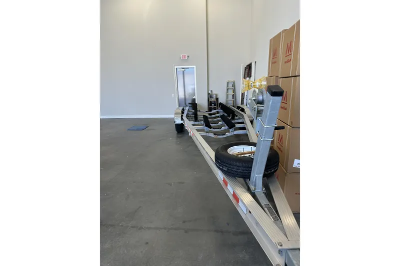 Slide: The Image of Empty boat trailer in a warehouse, suitable for 2019 Sea Hunt Gamefish 27. - 23