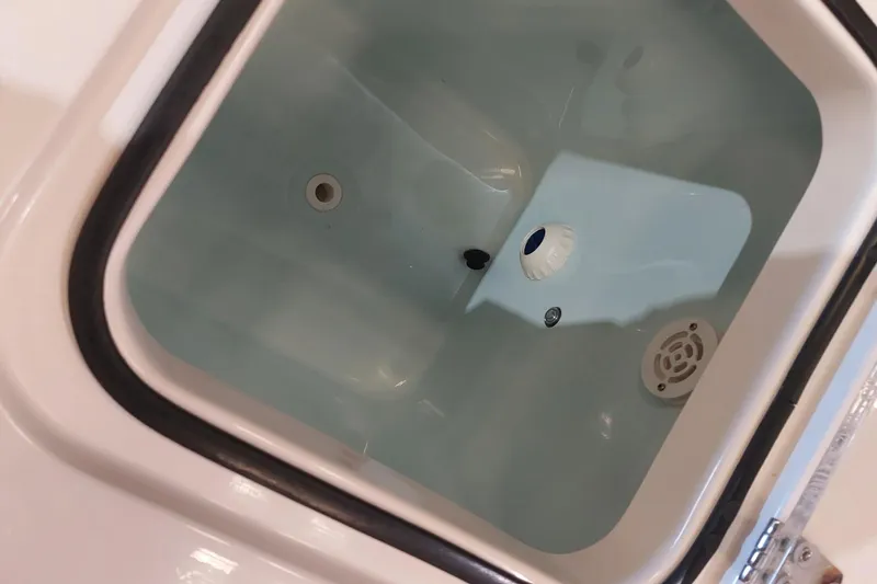 Slide: The Image of Livewell in 2019 Sea Hunt Gamefish 27 boat, featuring clean water and drainage system. - 31