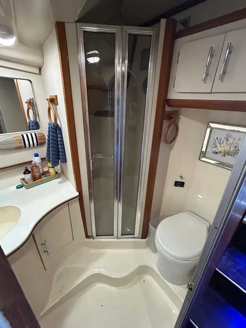 Slide: The Image of Bathroom of 1993 Luhrs Tournament 380 Convertible yacht with shower and toilet. - 23