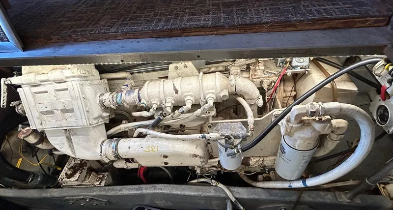 Slide: The Image of Engine compartment of a 1993 Luhrs Tournament 380 Convertible boat. - 24