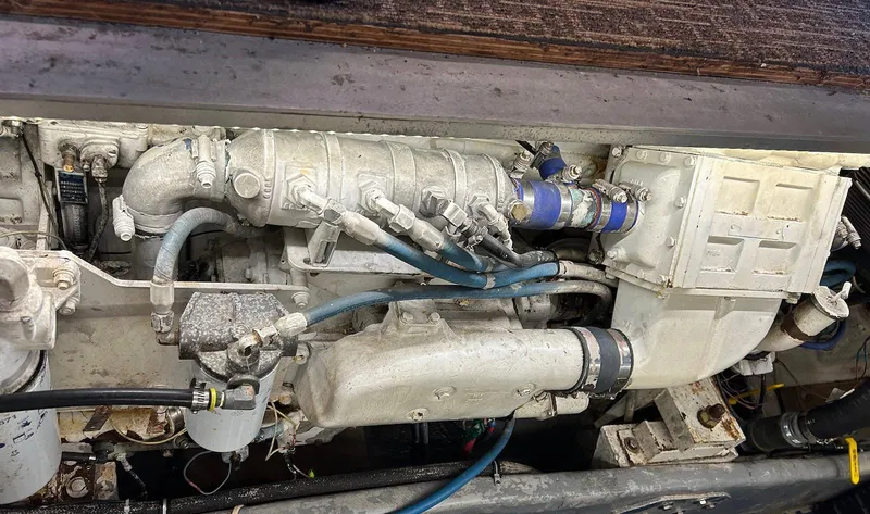 Slide: The Image of Engine compartment of a 1993 Luhrs Tournament 380 Convertible boat. - 25