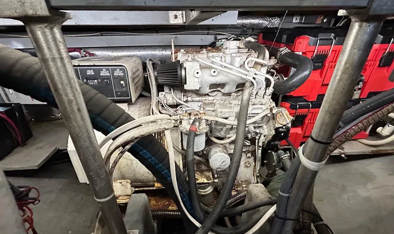 Slide: The Image of Engine compartment of a 1993 Luhrs Tournament 380 Convertible boat. - 26