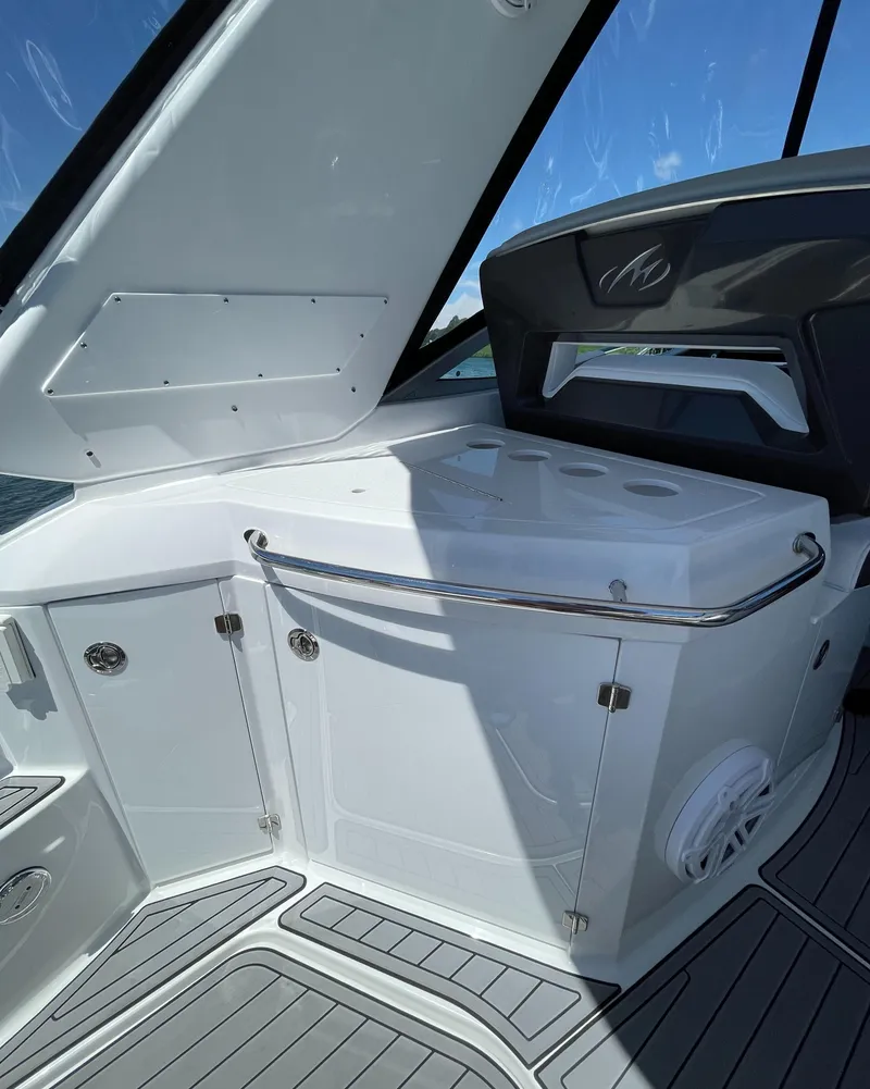 Slide: The Image of Interior of 2021 Monterey 335 Sport Yacht with sleek design. - 10