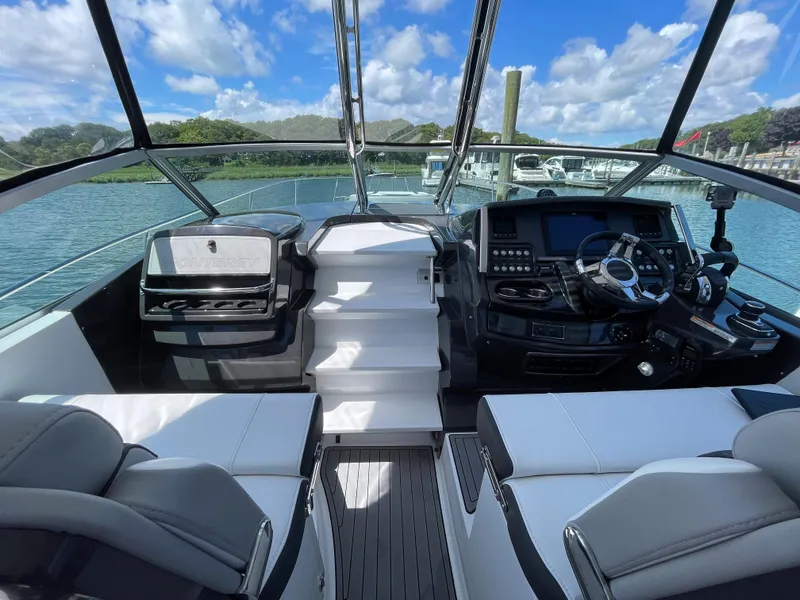 Slide: The Image of Interior of 2021 Monterey 335 Sport Yacht with modern cockpit. - 12
