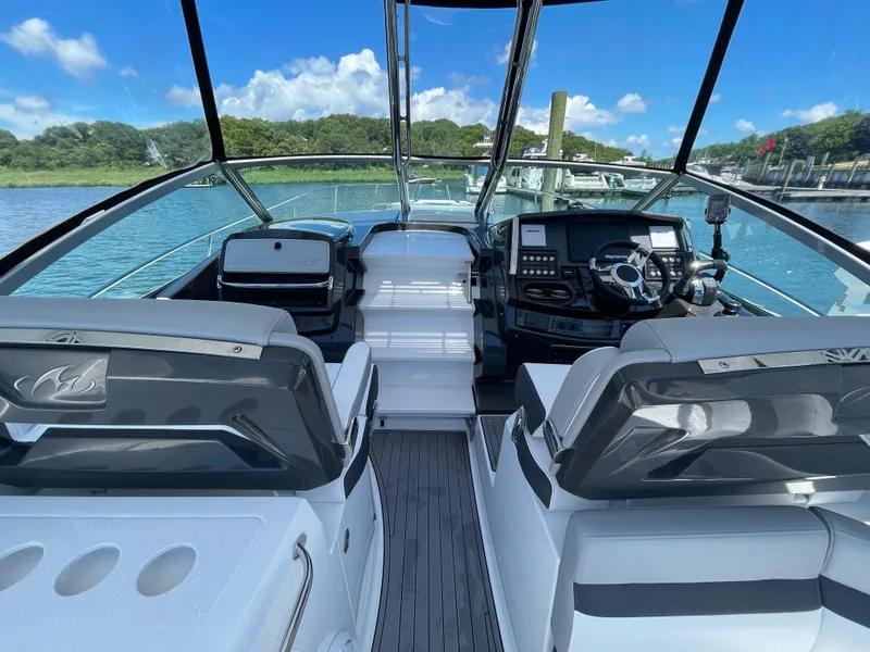 Slide: The Image of Interior of 2021 Monterey 335 Sport Yacht on calm waters. - 20