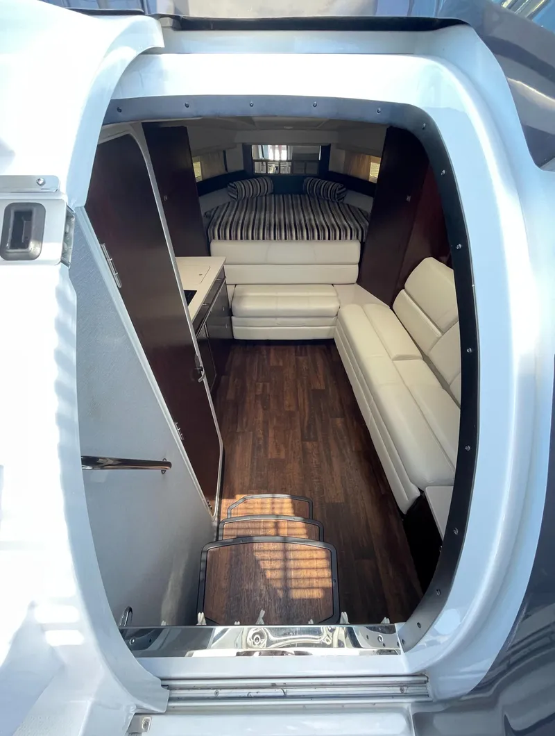 Slide: The Image of Interior of 2021 Monterey 335 Sport Yacht with sofa and bed. - 21