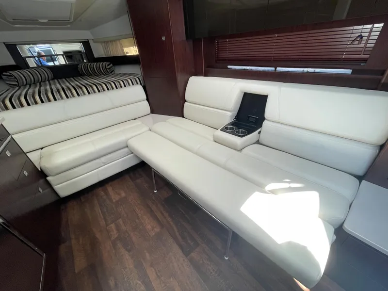 Slide: The Image of Interior of 2021 Monterey 335 Sport Yacht with elegant white leather sofas. - 26