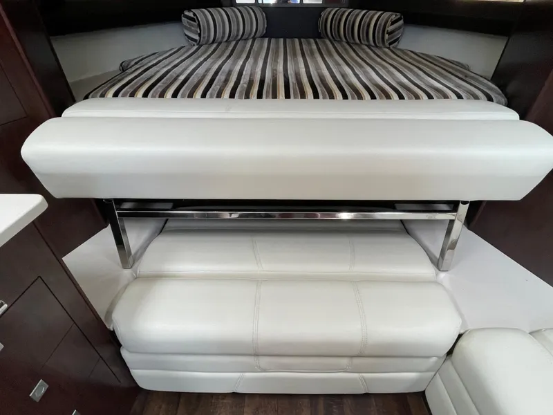 Slide: The Image of Interior of 2021 Monterey 335 Sport Yacht with luxurious white leather seating. - 29