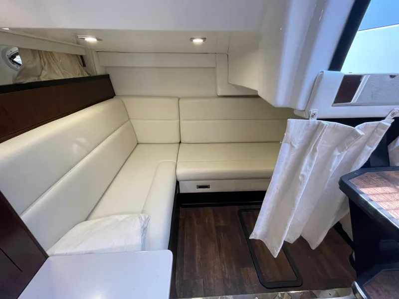 Slide: The Image of Interior of 2021 Monterey 335 Sport Yacht with white sofa. - 31