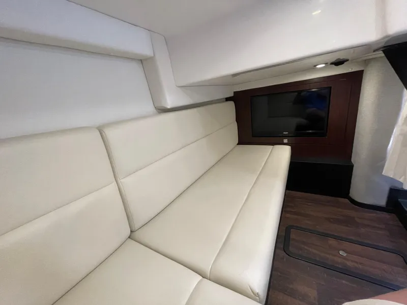 Slide: The Image of Interior of 2021 Monterey 335 Sport Yacht with sofa and TV. - 32