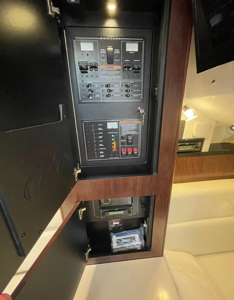Slide: The Image of Electrical control panel of 2021 Monterey 335 Sport Yacht. - 36