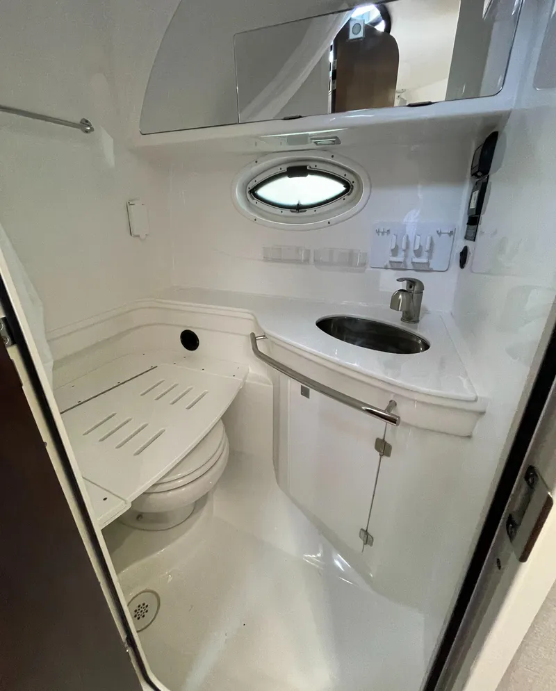 Slide: The Image of 2021 Monterey 335 Sport Yacht bathroom with sink and toilet. - 37