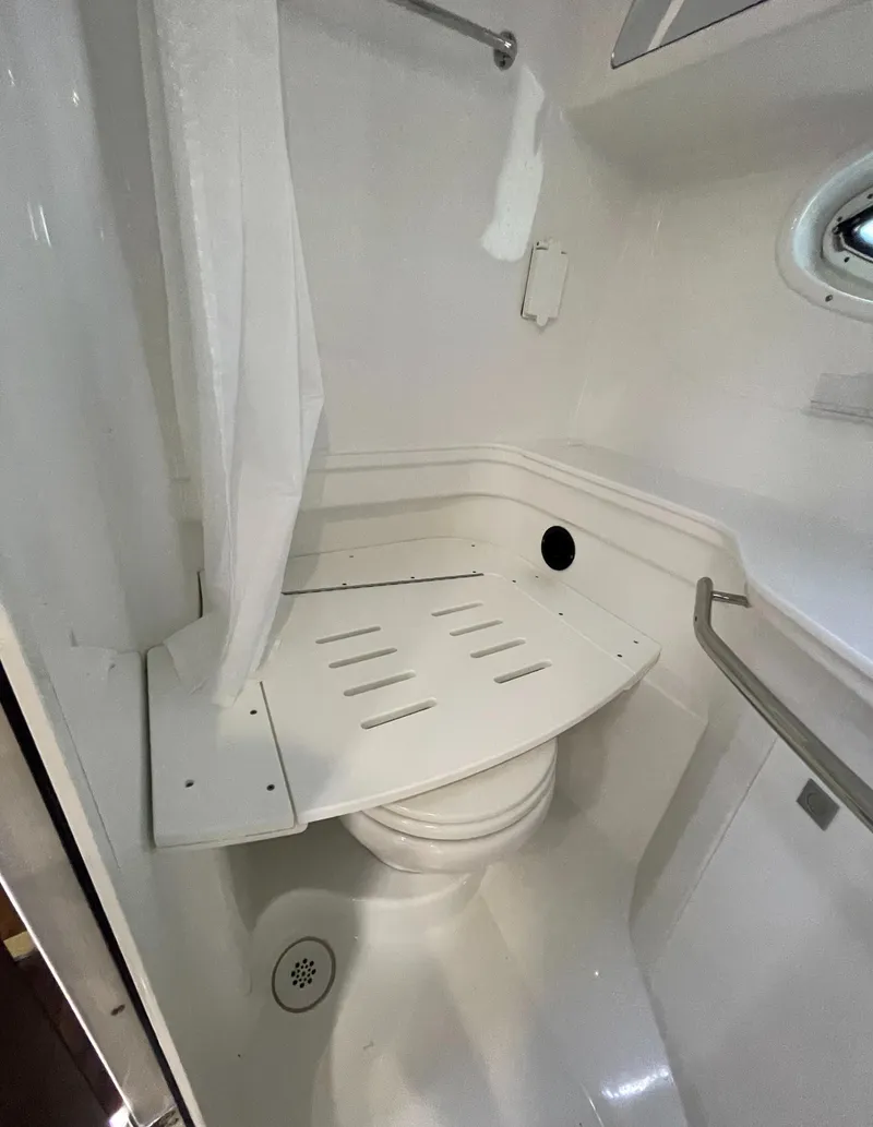 Slide: The Image of 2021 Monterey 335 Sport Yacht bathroom with shower and toilet. - 38