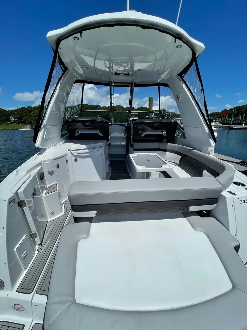 Slide: The Image of 2021 Monterey 335 Sport Yacht with spacious cockpit and luxurious design. - 6