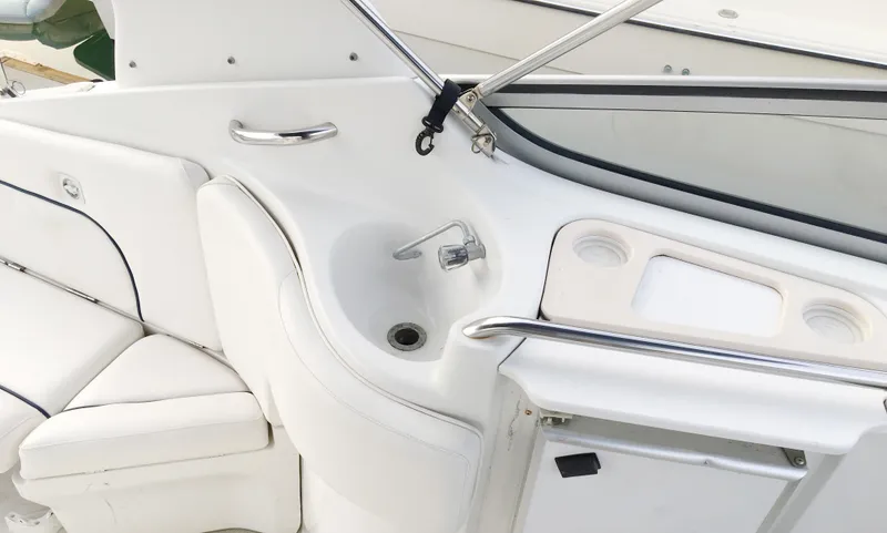 Slide: The Image of Interior of a 1999 Chris-Craft 320 Express Cruiser with sink. - 14
