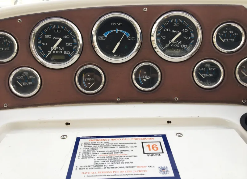 Slide: The Image of 1999 Chris-Craft 320 Express Cruiser dashboard with instrument panel. - 15