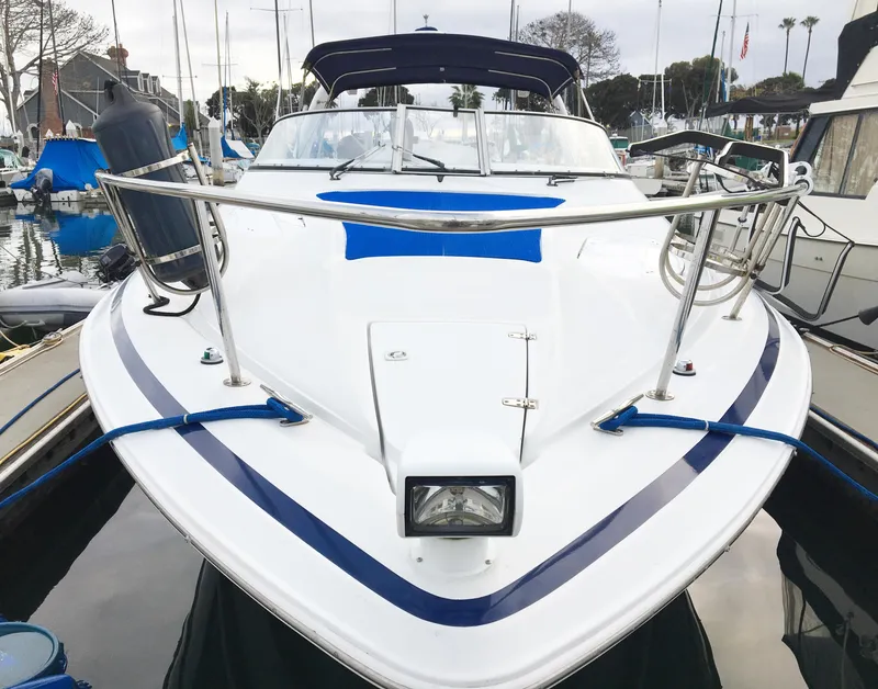 Slide: The Image of 1999 Chris-Craft 320 Express Cruiser docked in harbor. - 2