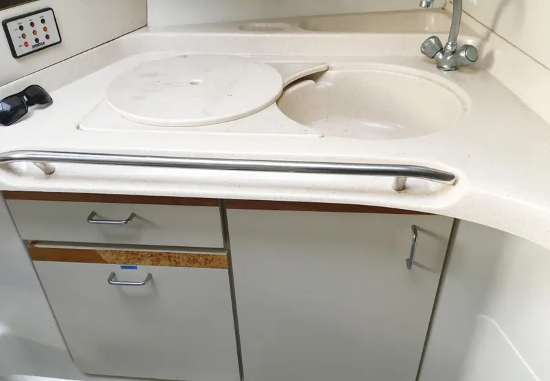 Slide: The Image of Galley area of 1999 Chris-Craft 320 Express Cruiser. - 25