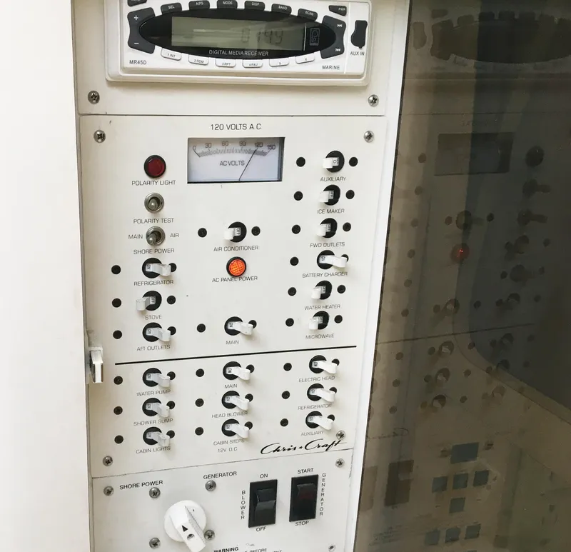 Slide: The Image of Control panel of 1999 Chris-Craft 320 Express Cruiser. - 26