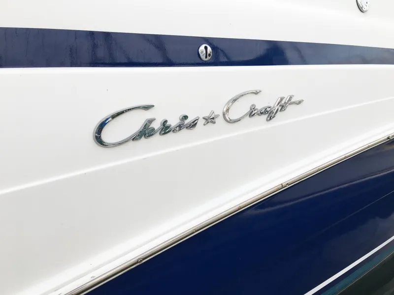 Slide: The Image of Close-up of Chris-Craft 320 Express Cruiser emblem, 1999 model. - 6