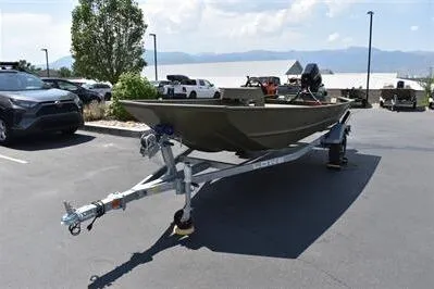 Slide: The Image of 2025 Lowe L1652MT Jon boat on trailer in parking lot, sunny day. - 3