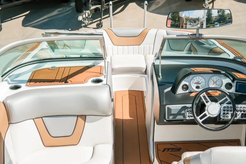 Slide: The Image of Interior of 2021 MB F24 Tomcat Alpha boat with sleek dashboard and seating. - 18