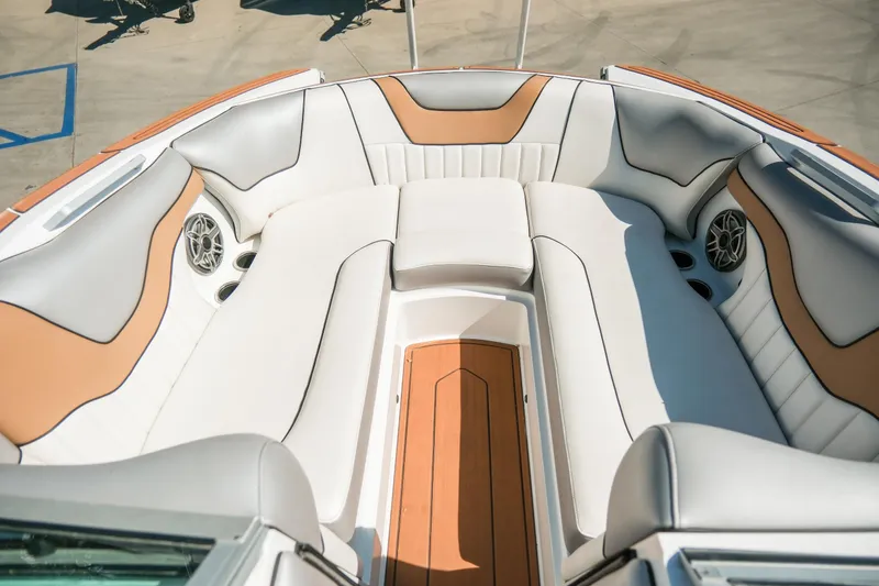 Slide: The Image of Luxurious interior of 2021 MB F24 Tomcat Alpha boat with plush seating and speakers. - 20