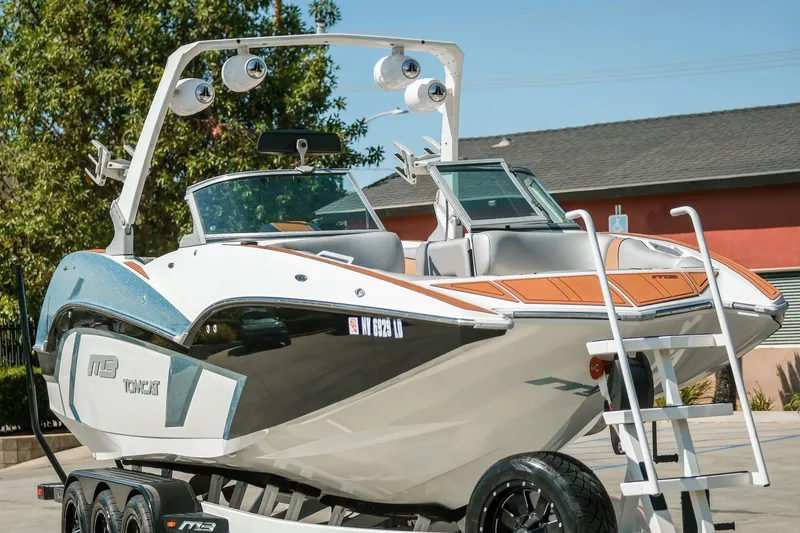 Slide: The Image of 2021 MB F24 Tomcat Alpha boat with sleek design and modern features. - 7